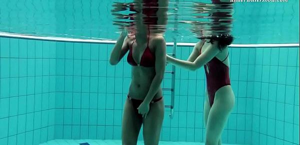  Lesbian fun underwater and naked stripping